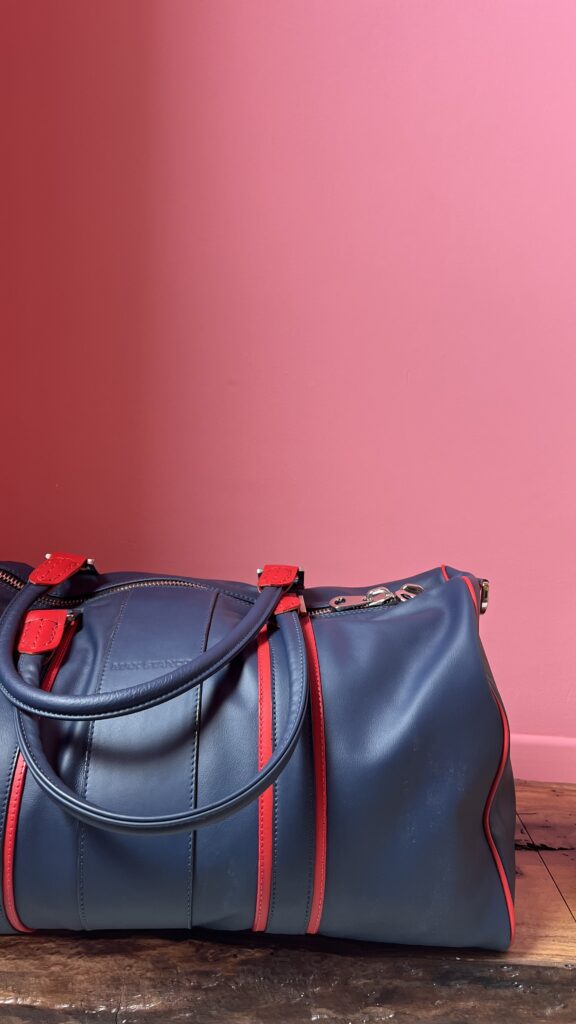 Max Stanco showroom leather bags and accessories – premium Italian full-grain leather duffles and totes in historic Melfi atelier